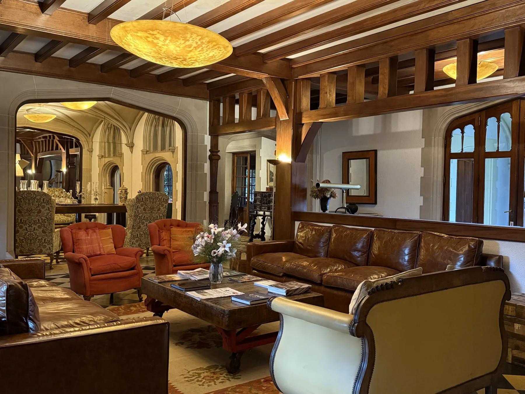The warm wood-panelled lounge at Estancia Villa María