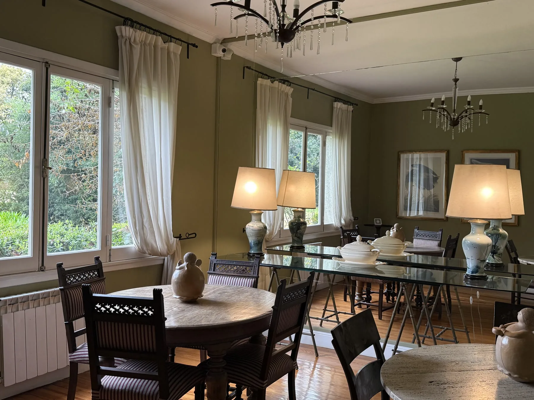 The sunlit tea room overlooking the gardens at Estancia Villa María