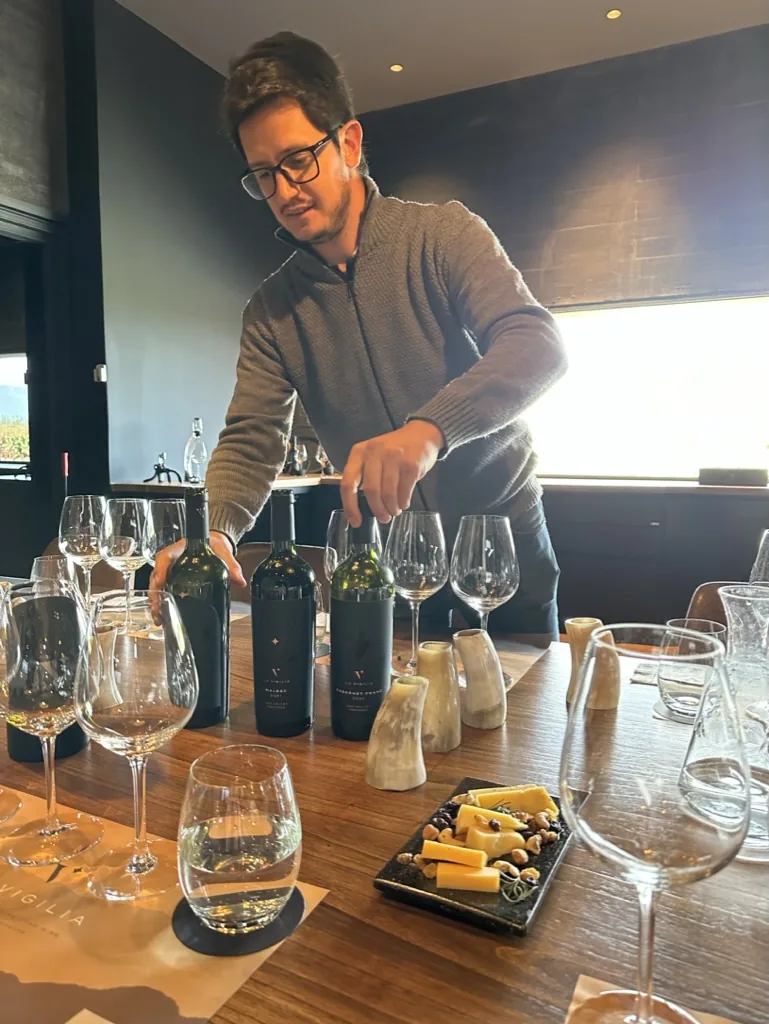A private wine tasting being prepared at a table in Mendoza